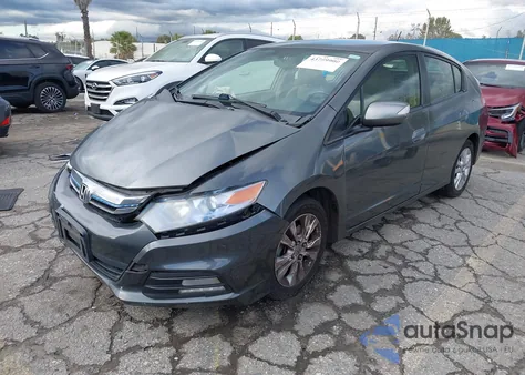 2013 Honda Insight Ex z USA, uszkodzony, nr VIN JHMZE2H70DS002121